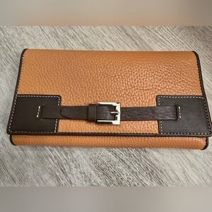Levenger Tri-Fold Leather Wallet with Buckle accent.